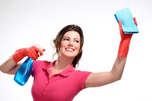 Deep cleaning a sofa with professional upholstery tools